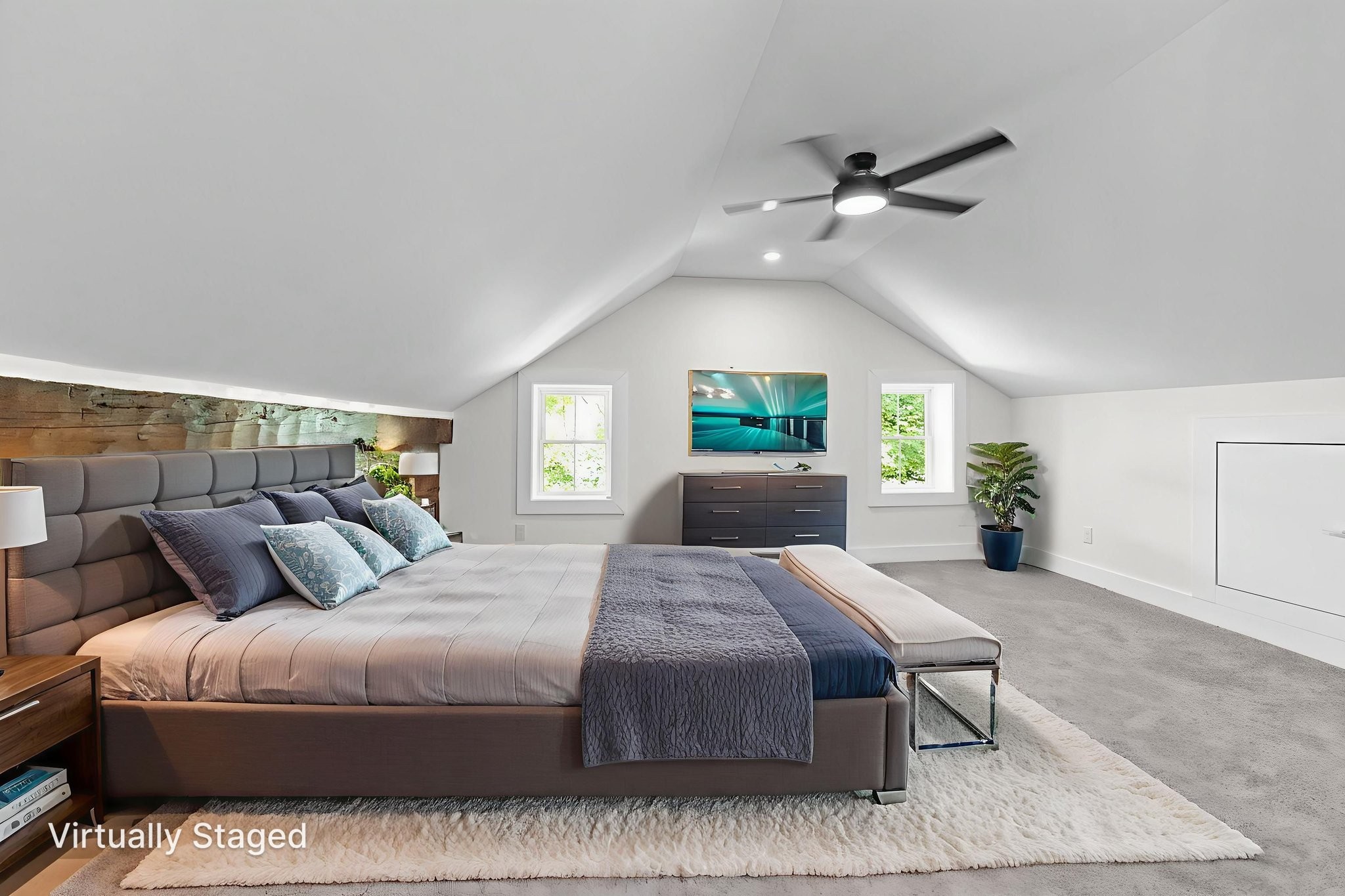 1881 New Herman Road Fayetteville, TN 37334 - Photo 33 of 58 a bedroom with a large bed and a chandelier