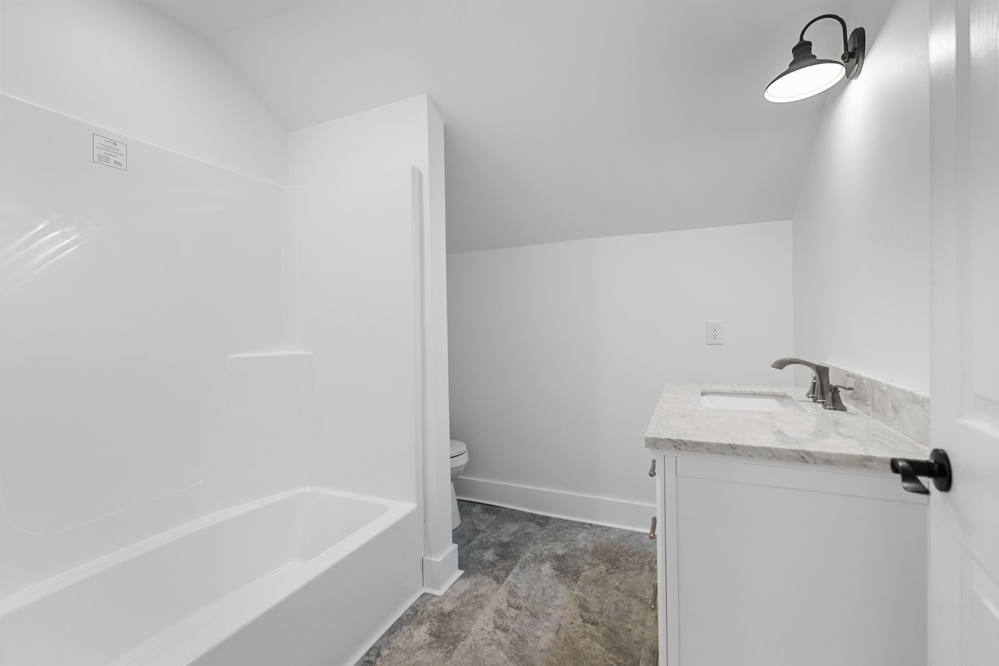 1881 New Herman Road Fayetteville, TN 37334 - Photo 34 of 58 a bathroom with a granite countertop sink toilet and bathtub