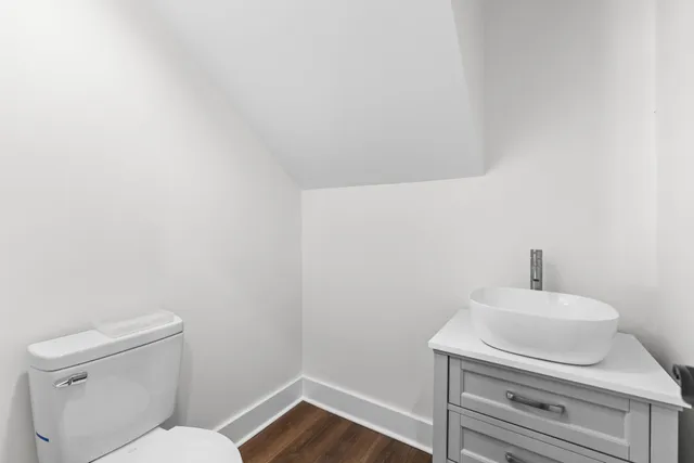 a view of balcony with wooden floor and fence