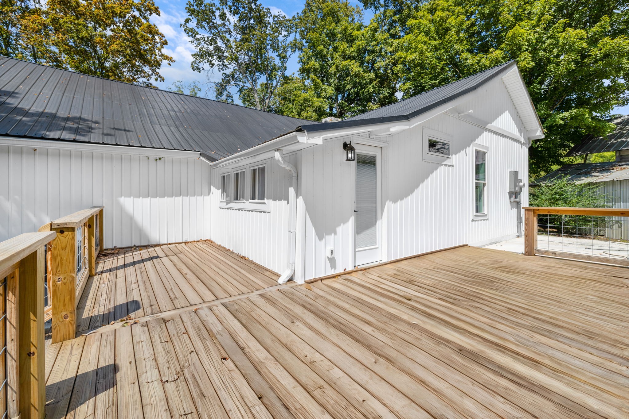 1881 New Herman Road Fayetteville, TN 37334 - Photo 38 of 58 a view of backyard with a deck and wooden floor