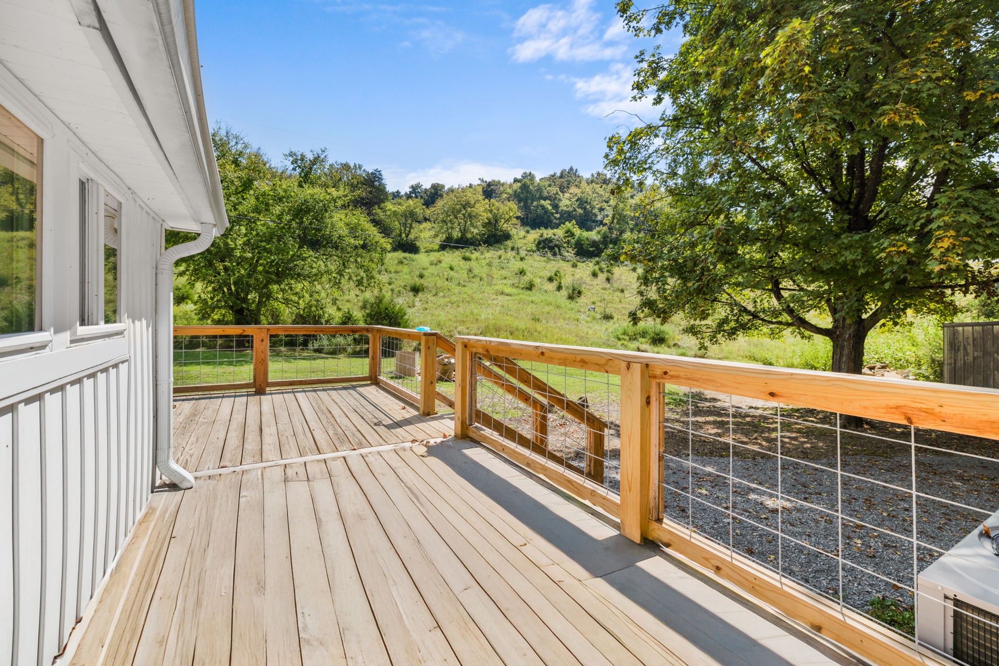 1881 New Herman Road Fayetteville, TN 37334 - Photo 40 of 58 a view of balcony with wooden floor and fence