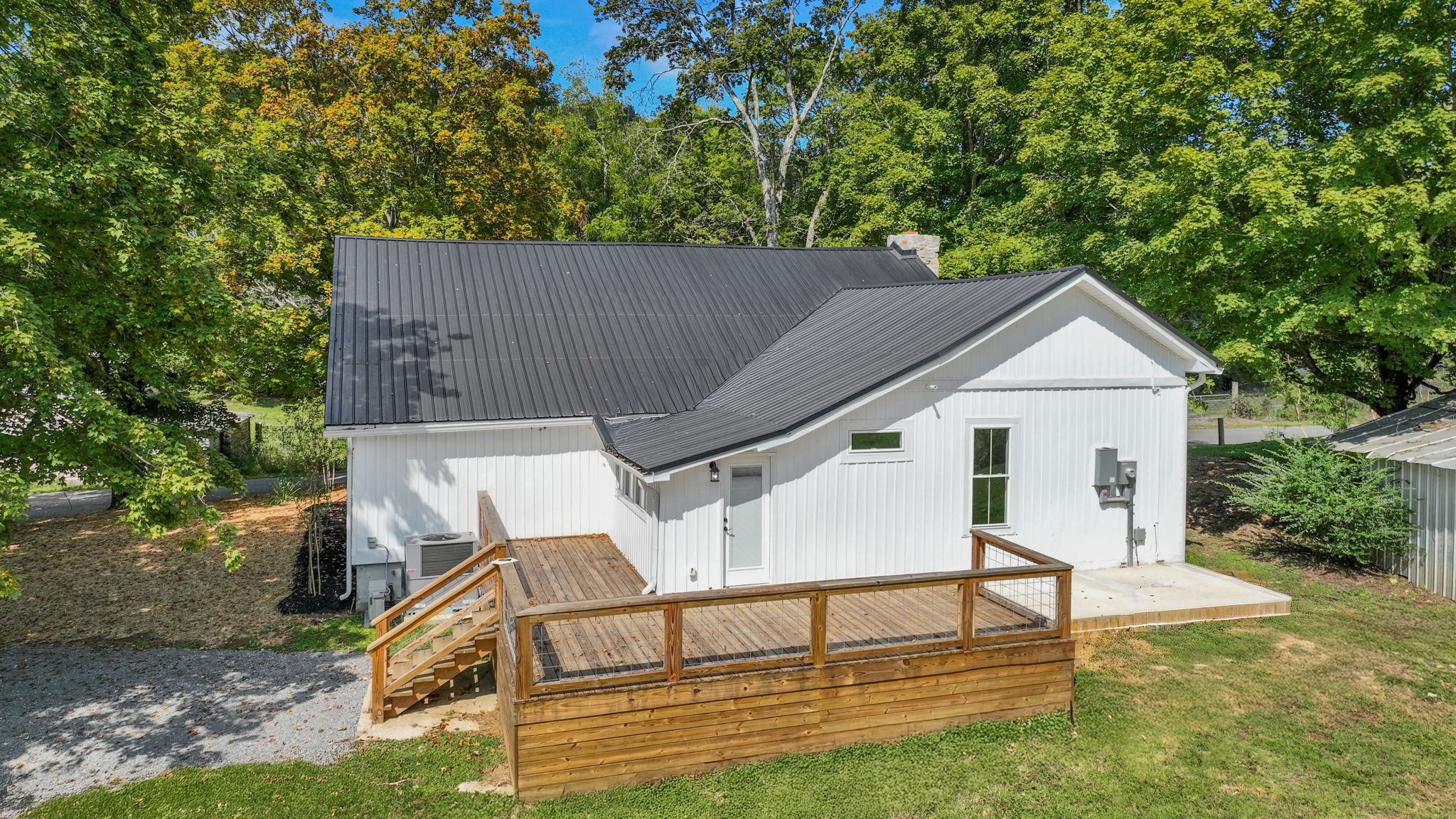 1881 New Herman Road Fayetteville, TN 37334 - Photo 44 of 58 a view of house with backyard and seating area