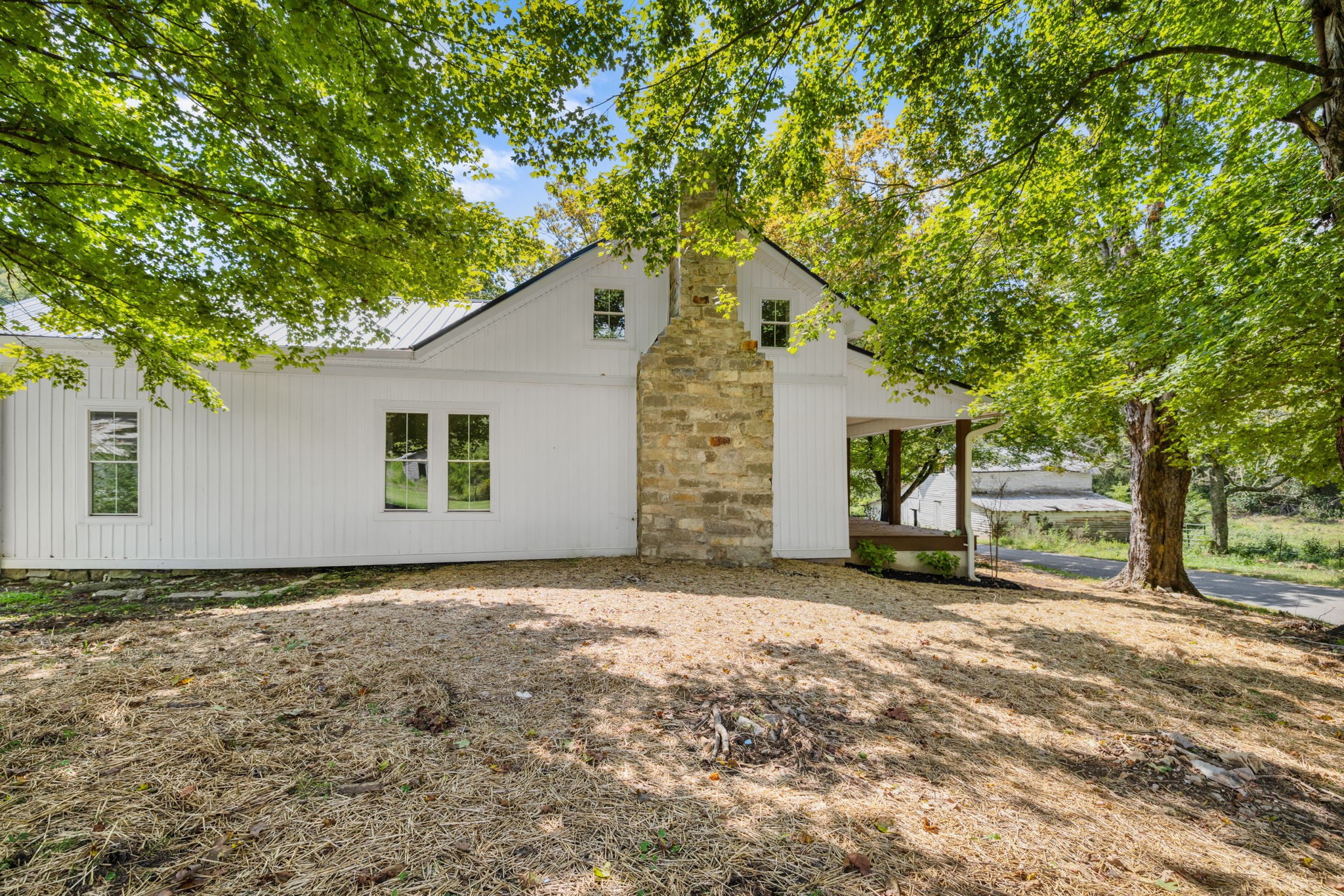 1881 New Herman Road Fayetteville, TN 37334 - Photo 47 of 58 a view of a house with a tree in the background