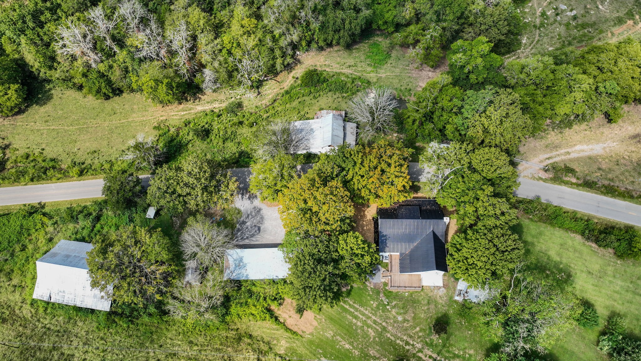 1881 New Herman Road Fayetteville, TN 37334 - Photo 55 of 58 an aerial view of a house with a yard
