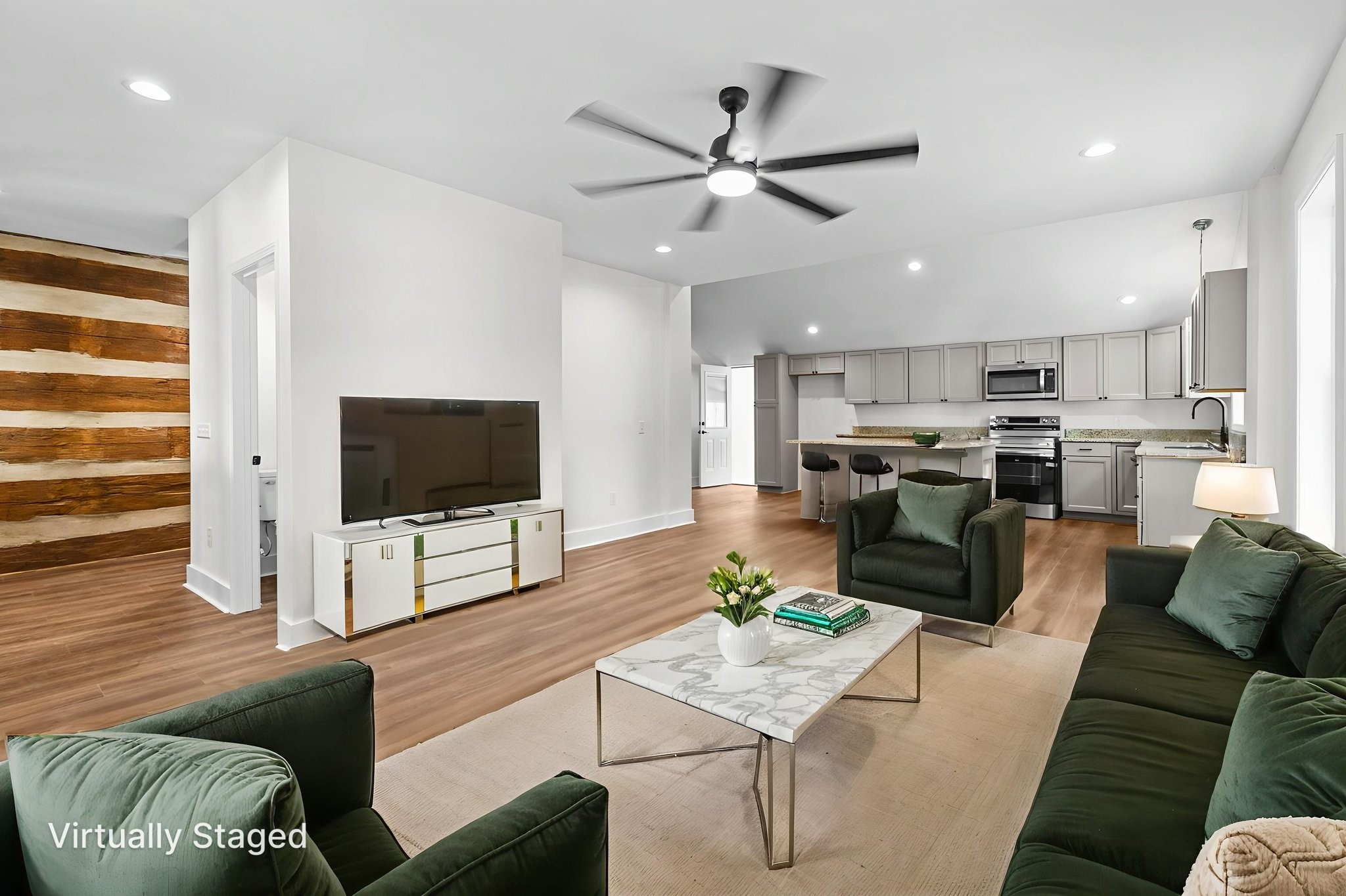 1881 New Herman Road Fayetteville, TN 37334 - Photo 9 of 58 a living room with furniture kitchen view and a flat screen tv