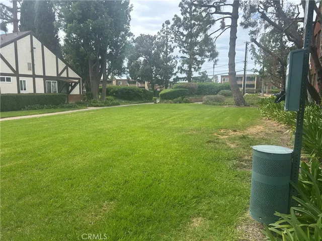 a room with gym equipment and a large window