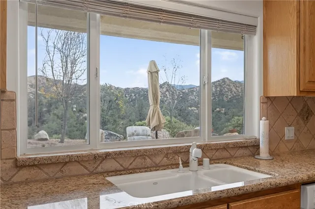 a bed room with a bed and a chandelier