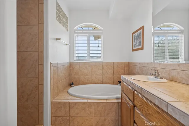 a view of an outdoor space with furniture and sunset view