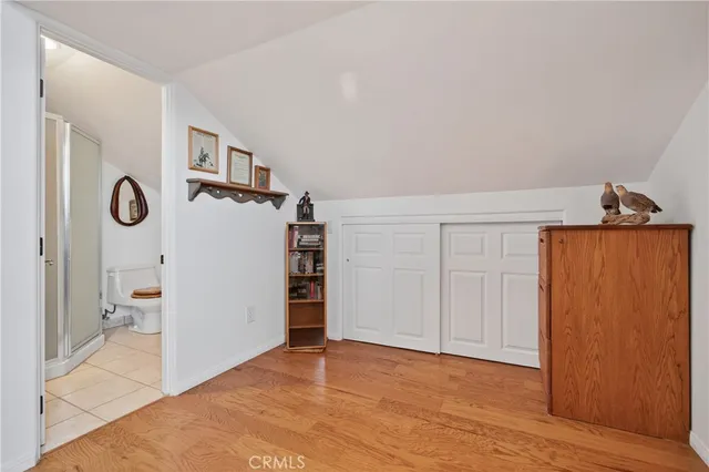 a kitchen with a sink and a wooden cabinets