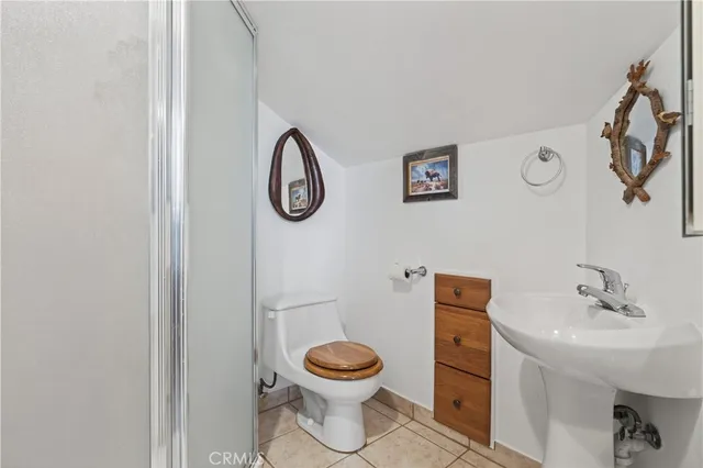 a view of a patio with couple of chairs