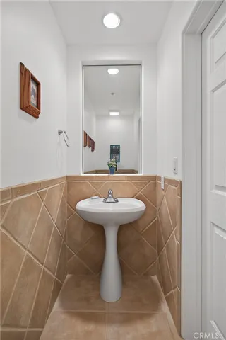 a view of a dry yard with mountains in the background