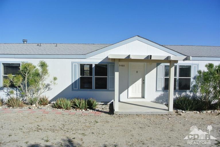 15488 Desert View Road Whitewater, CA 92282 - Photo 2 of 19 a front view of a house with a yard