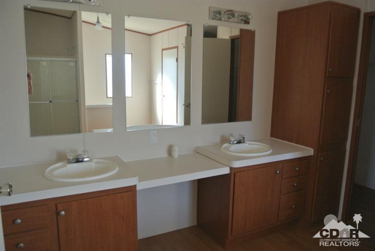 15488 Desert View Road Whitewater, CA 92282 - Photo 12 of 19 a bathroom with a sink and a mirror