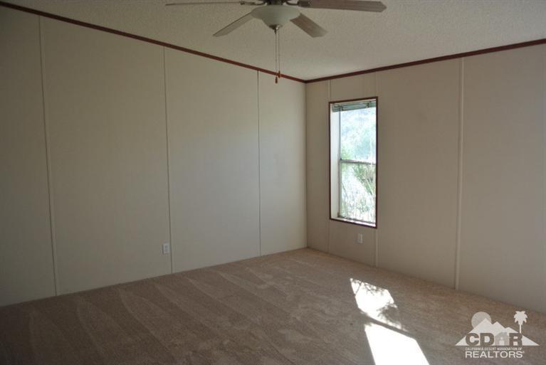 15488 Desert View Road Whitewater, CA 92282 - Photo 7 of 19 a view of a livingroom with a window