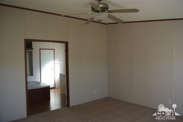 15488 Desert View Road Whitewater, CA 92282 - Photo 8 of 19 a view of empty room with window
