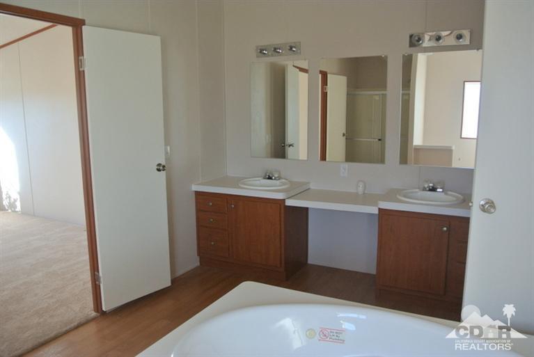 15488 Desert View Road Whitewater, CA 92282 - Photo 10 of 19 a bathroom with a sink and a mirror