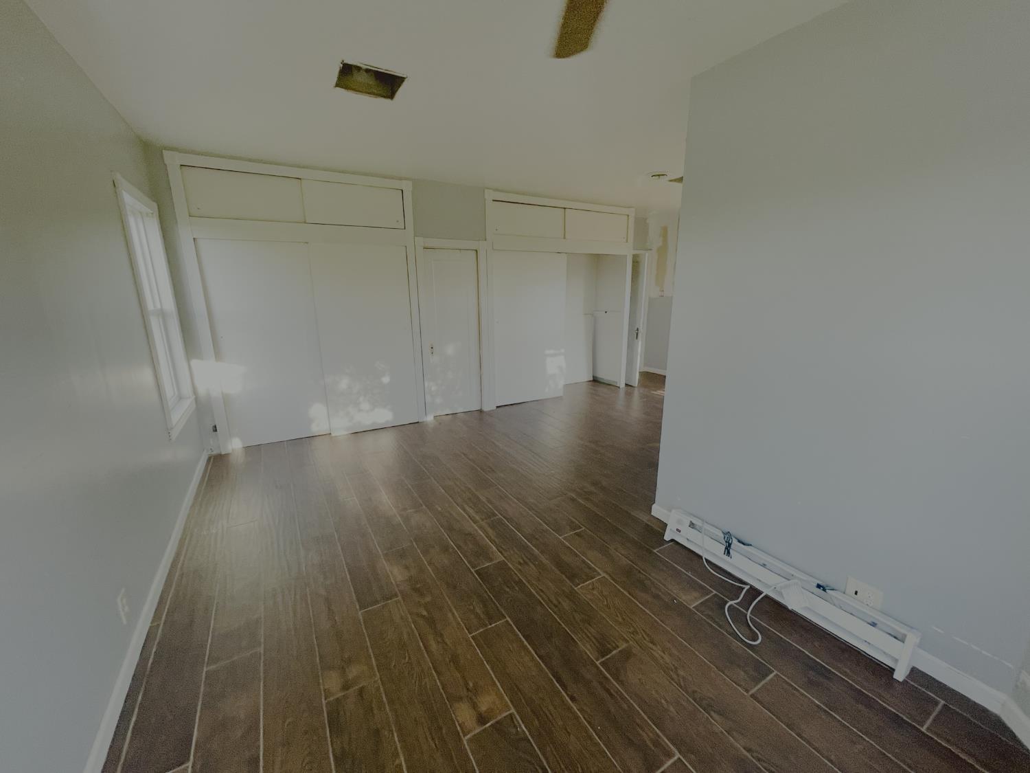210 South Summit Street Ione, CA 95640 - Photo 11 of 27 a view of a room with wooden floor