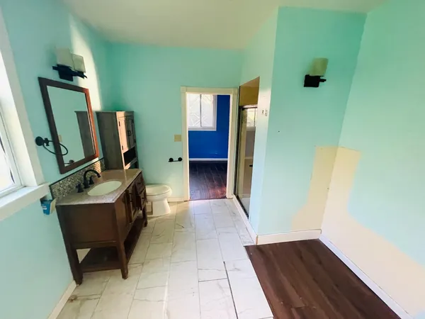 a view of a hallway with workspace