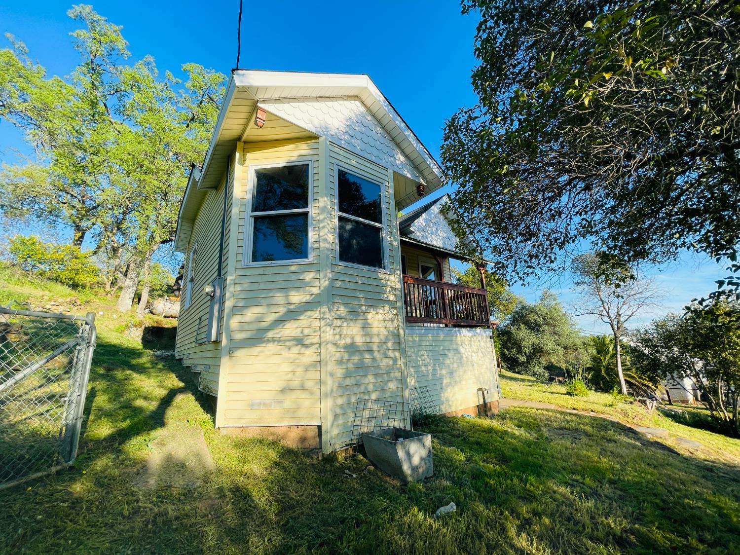 210 South Summit Street Ione, CA 95640 - Photo 9 of 27 a view of a house with a yard