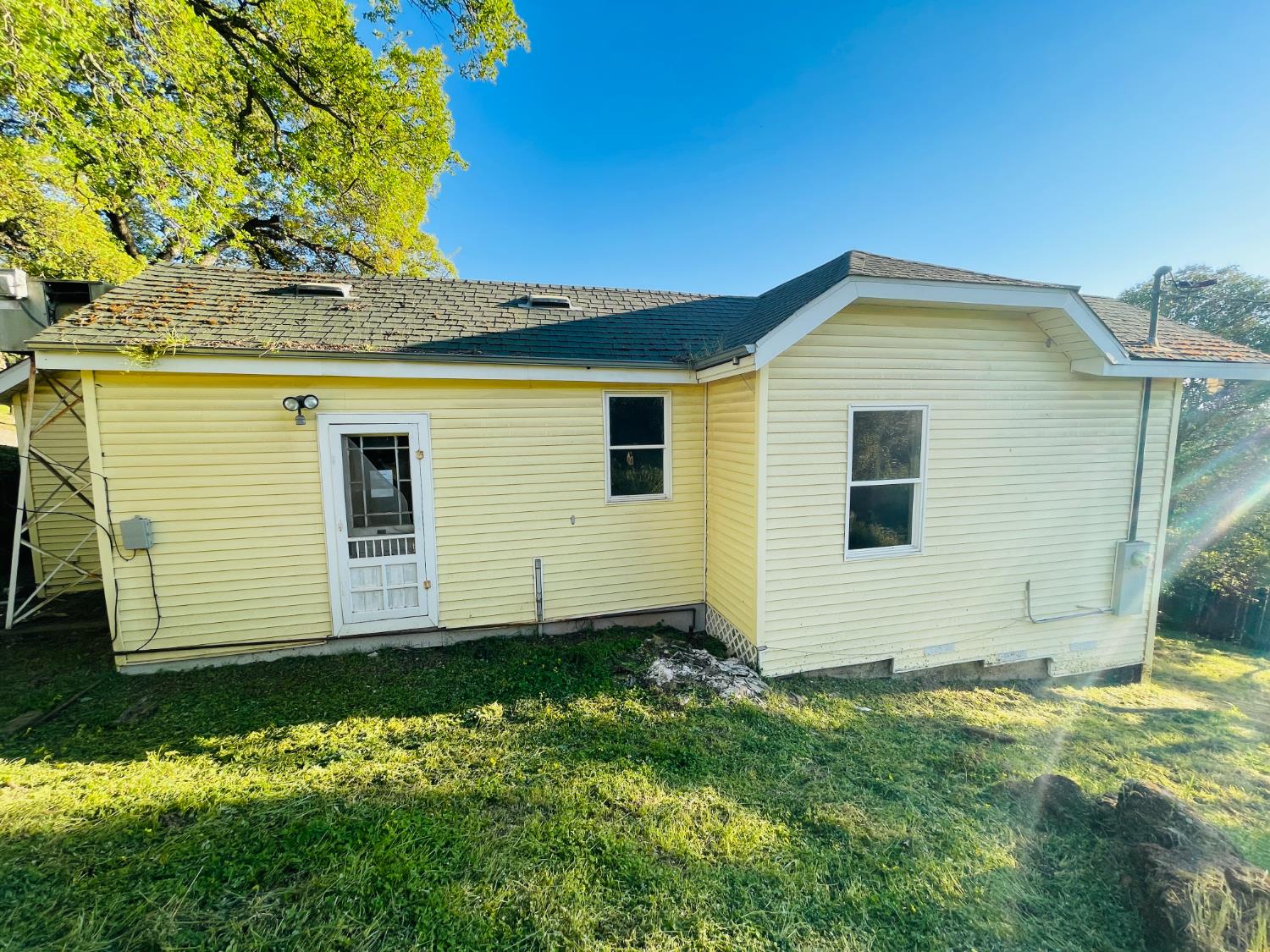 210 South Summit Street Ione, CA 95640 - Photo 10 of 27 a view of a house with a yard
