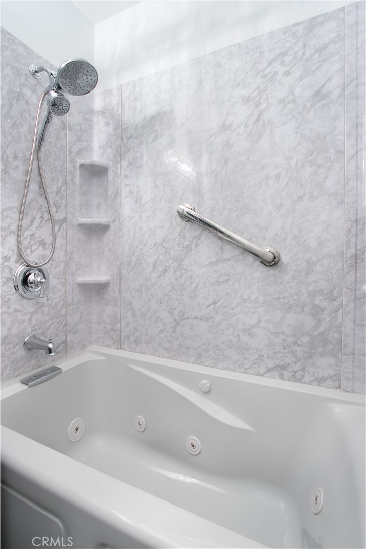 1034 Thompson Avenue Banning, CA 92220 - Photo 10 of 24 a bathroom with a bath tub and a shower