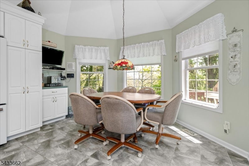 15 Bracken Hill Road Hamburg, NJ 07419 - Photo 19 of 44 a dining room with furniture window and outside view