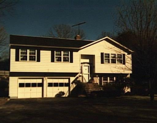 1580 Mill Plain Road Fairfield, CT 06824 - Photo 1 of 1 a front view of a house with a porch