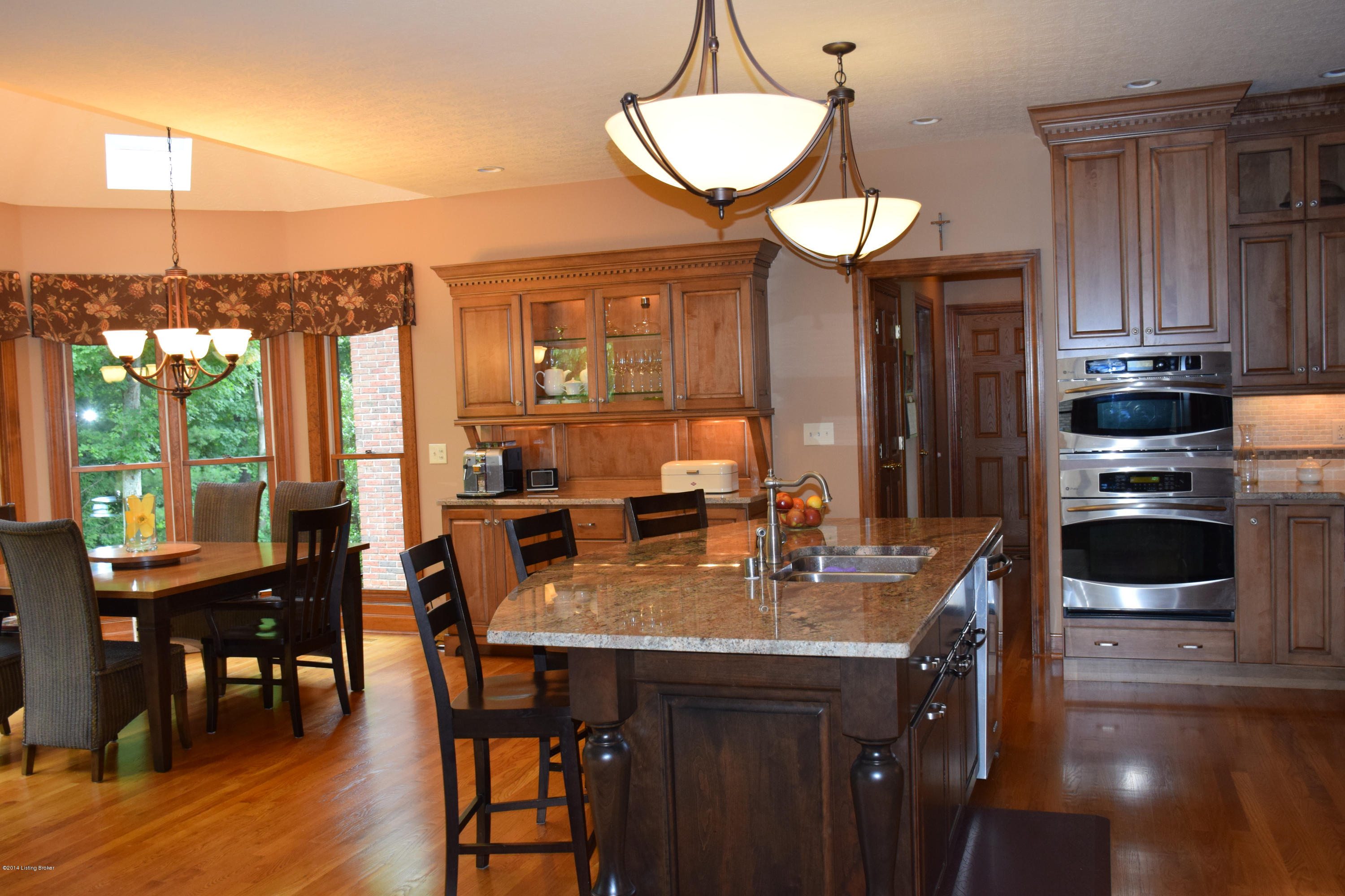 7513 Turner Ridge Road Crestwood, KY 40014 - Photo 3 of 38 This kitchen has been updated to include granite counter tops, stainless steel appliances, double ovens, and an oversized island.