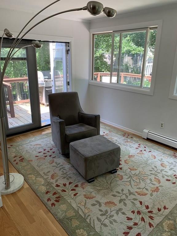 158 Tilden Road Scituate, MA 02066 - Photo 11 of 33 a living room with furniture and a large window