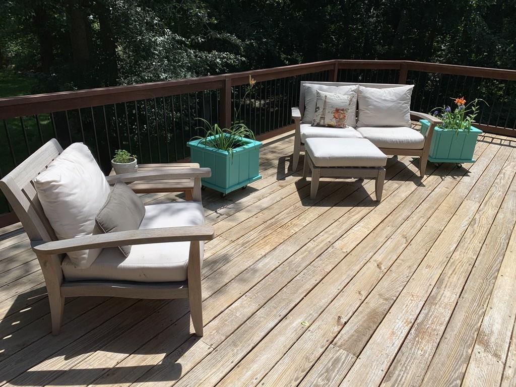 158 Tilden Road Scituate, MA 02066 - Photo 20 of 33 a roof deck with couches and wooden floor