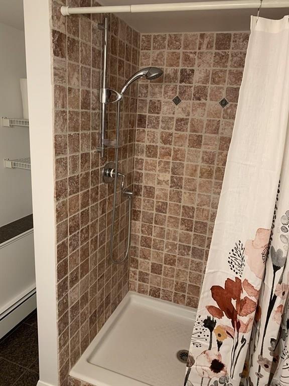 158 Tilden Road Scituate, MA 02066 - Photo 29 of 33 a bathroom with a bathtub and a shower