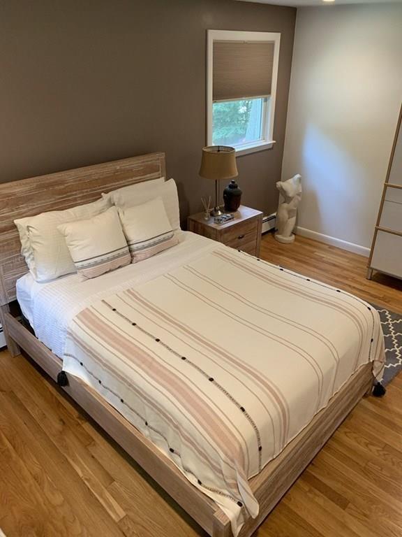 158 Tilden Road Scituate, MA 02066 - Photo 3 of 33 a bedroom with a bed and a window