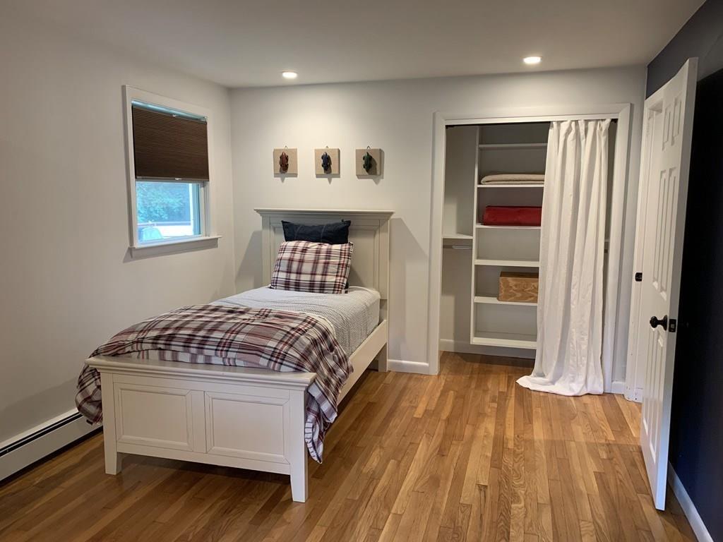 158 Tilden Road Scituate, MA 02066 - Photo 4 of 33 a bedroom with a bed and a window