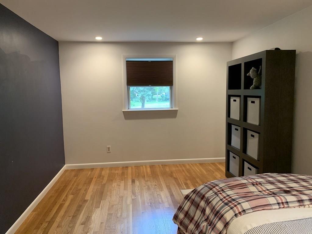 158 Tilden Road Scituate, MA 02066 - Photo 5 of 33 a bedroom with a bed and a window