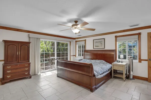 a view of balcony with wooden floor and fence