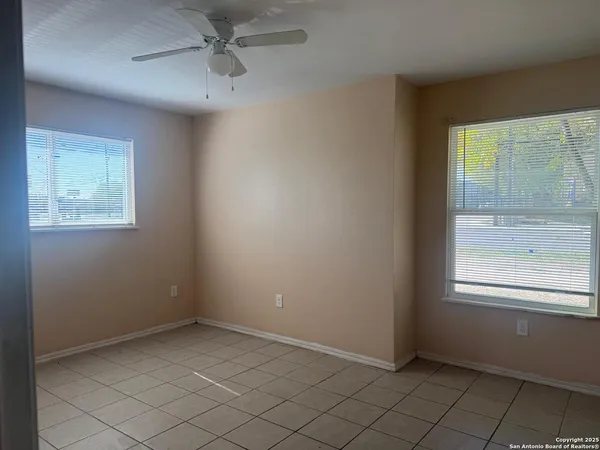 an empty room with windows