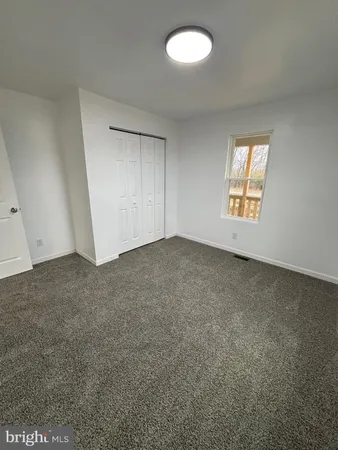 an empty room with a door