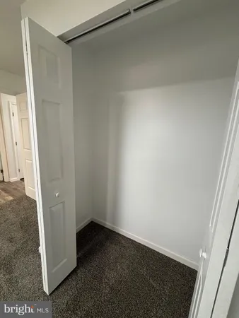 an empty room with a door