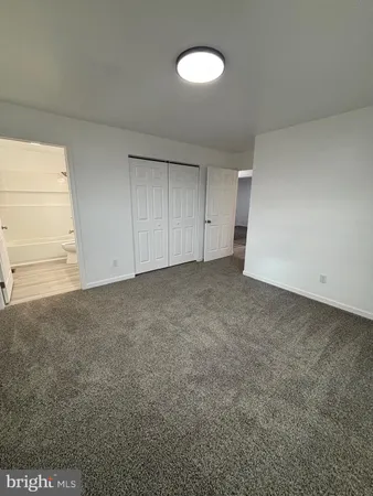 an empty room with a door