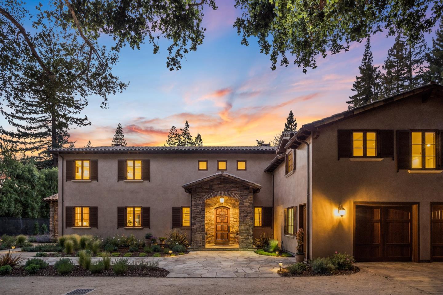 1180 Arbor Road Menlo Park, CA 94025 - Photo 1 of 1 a front view of a multi story residential apartment building with a yard