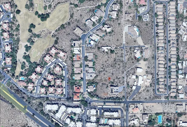 an aerial view of house with yard