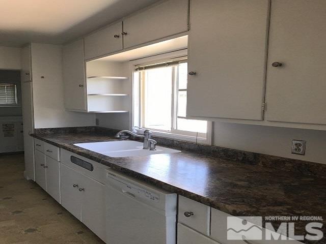 1981 Wilder Street Reno, NV 89512 - Photo 13 of 25 a kitchen with a sink and cabinets