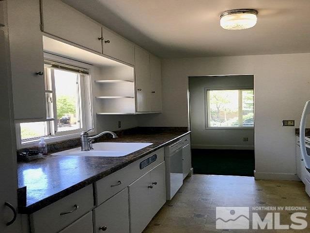 1981 Wilder Street Reno, NV 89512 - Photo 14 of 25 a kitchen with a sink and cabinets