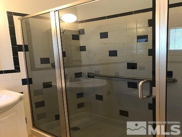 1981 Wilder Street Reno, NV 89512 - Photo 5 of 25 a bathroom with a shower and a sink