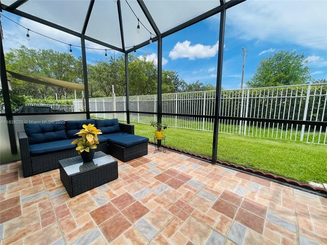 a view of a garden with a bench