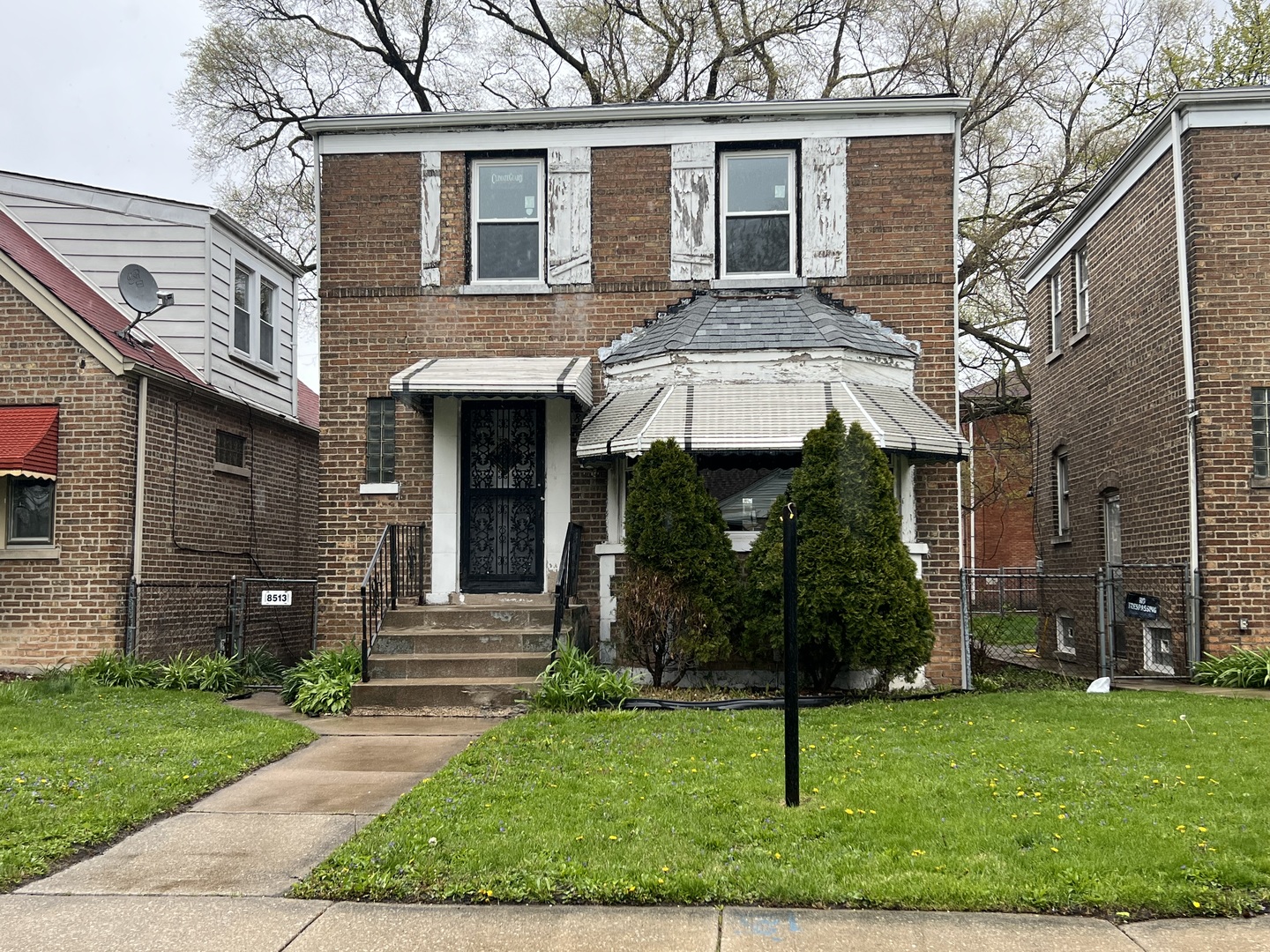 front view of a house with a yard