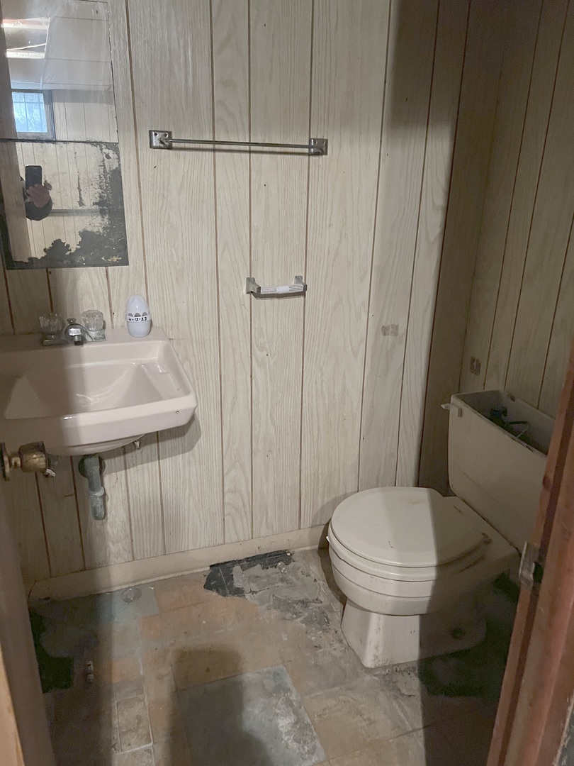 Undisclosed Address Chicago, IL 60620 - Photo 11 of 18 a bathroom with a sink toilet and shower