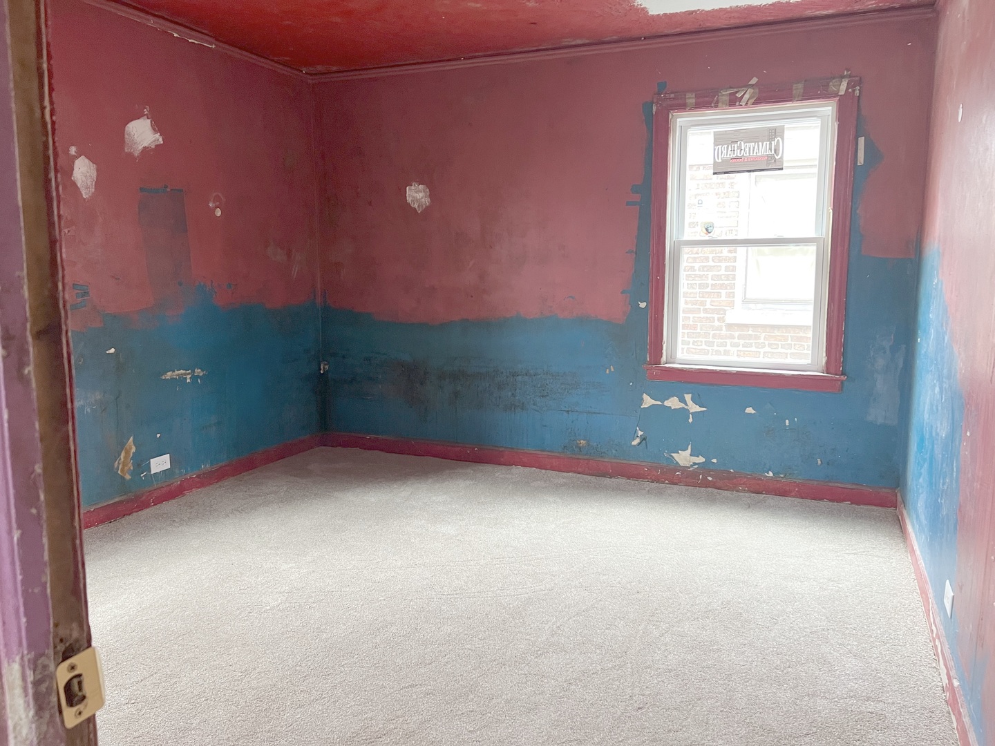 Undisclosed Address Chicago, IL 60620 - Photo 14 of 18 a view of an empty room with a window