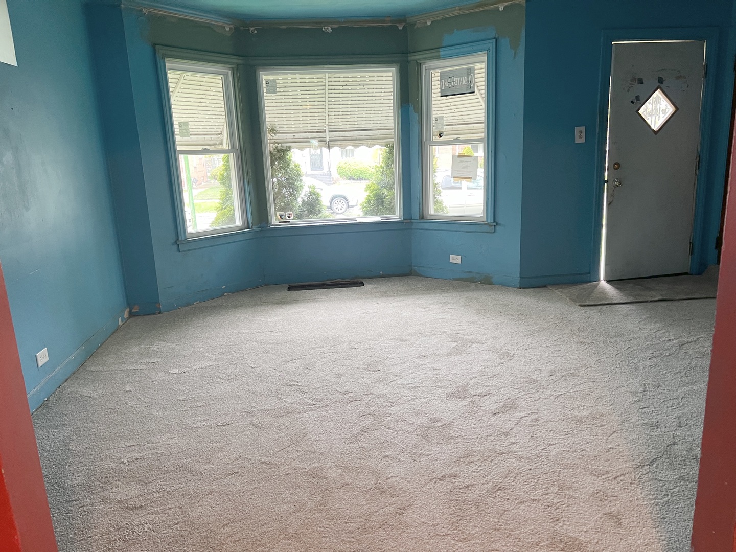 Undisclosed Address Chicago, IL 60620 - Photo 2 of 18 an empty room with windows and closet