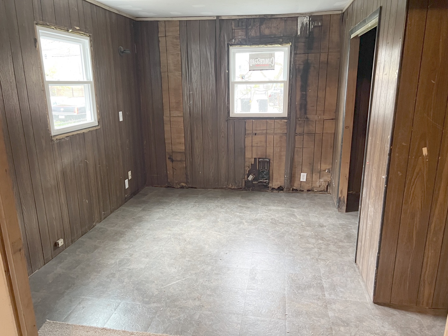 Undisclosed Address Chicago, IL 60620 - Photo 5 of 18 an empty room with windows